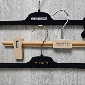 Bundle of three authentic pants/skirts clip hangers